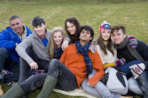 Preview: Happy Friends Laying On Grass