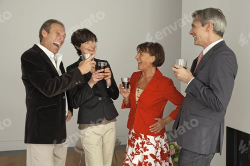 Preview: Four People Holding Wine Glasses