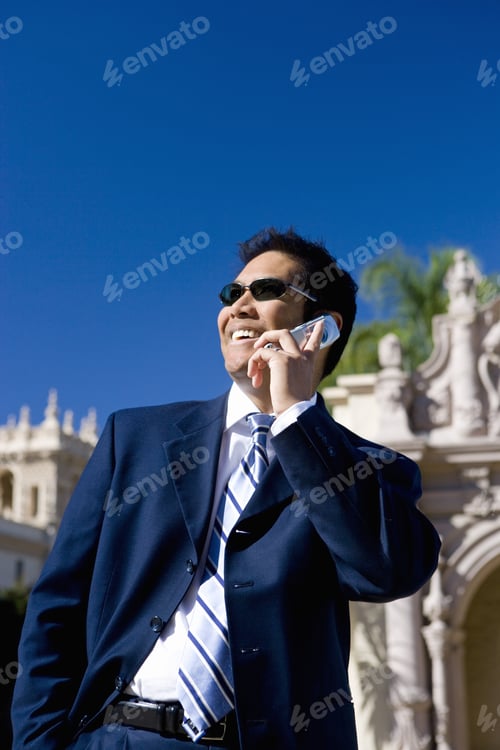 Preview: Businessman Standing Near Historic Building