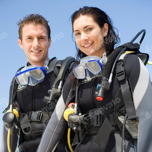 Preview: Couple On Vacation Wearing Scuba Diving Gear Smiling At Camera
