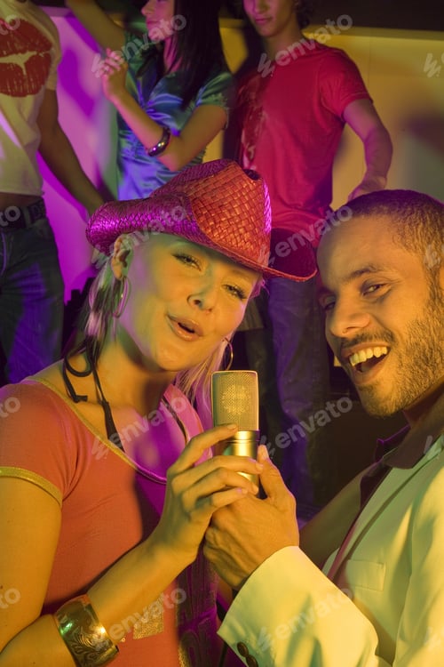 Preview: Portrait Of A Young Couple Singing In A Nightclub