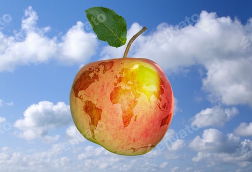 Preview: Environmental Concept With World Map Imposed On Apple On Blue Sky