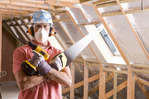 Preview: Construction Worker Wearing Protective Mask And Holding Tools In Attic