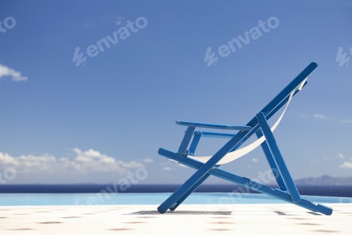 Preview: An Empty Deck Chair By A Pool