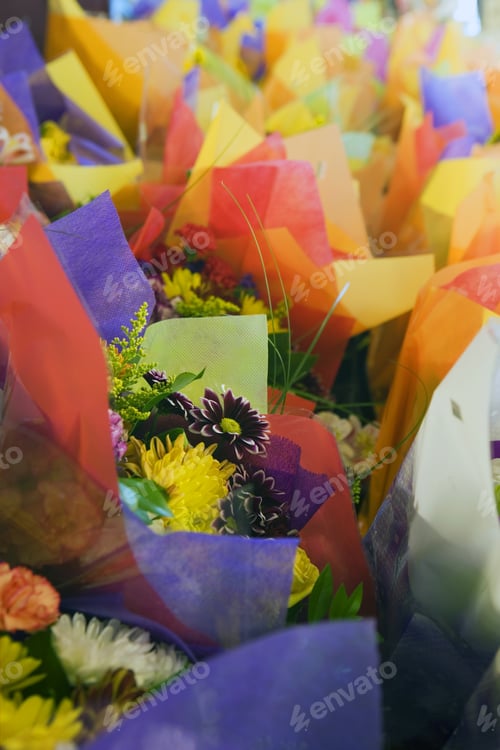 Preview: Multi-Coloured Flower Bouquets On Display In Florists (Differential Focus)