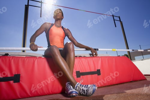 Preview: Female Pole Vault Athlete, Low Angle View (Lens Flare)