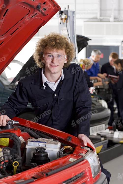 Preview: Student Repairing Car In Automotive Vocational School