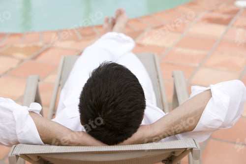 Preview: Man Relaxing By The Pool