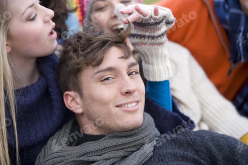 Preview: Teenage Girl Playing With Young Man'S Hair