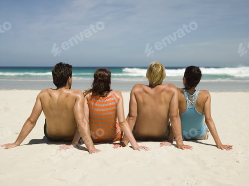 Preview: Couples Sitting On The Beach.