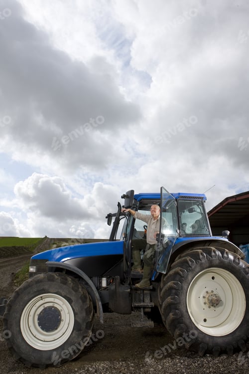 Preview: Farmer Leaning Out Of Tractor