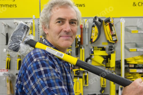 Preview: Man With Sledge Hammer In Hardware Store, Portrait