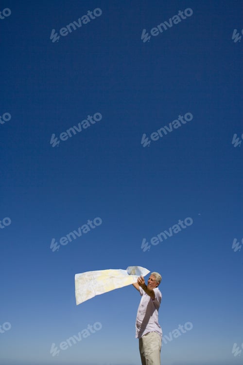 Preview: Man Looking At Map