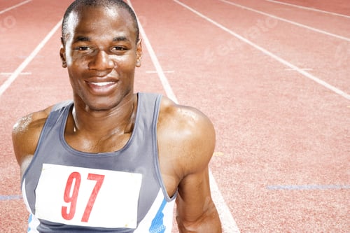 Preview: Portrait Of A Male Athlete Resting Sitting On A Running Track