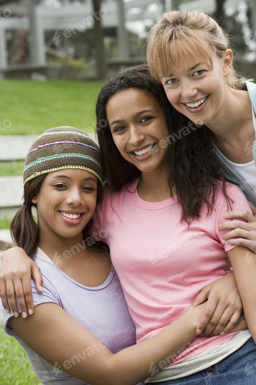 Preview: Three Young Women Embracing, Smiling, Front View, Portrait