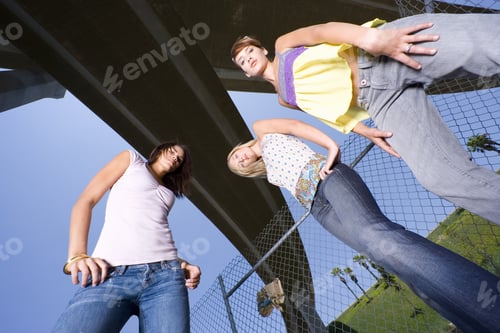 Preview: Small Group Of Friends Beneath Overpass, Portrait, Low Angle View