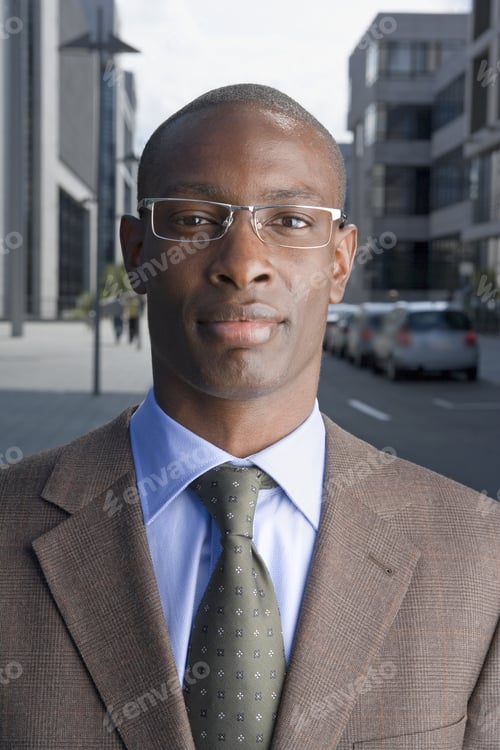 Preview: A Portrait Of A Businessman Wearing Glasses.