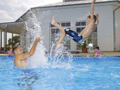 Preview: Father And Son Playing In Pool