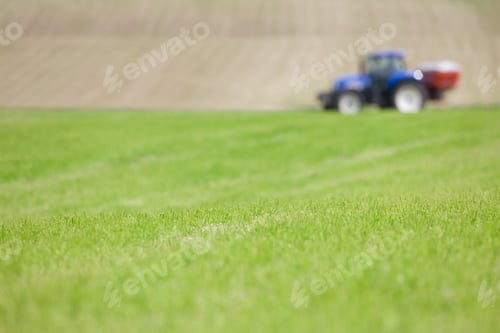 Preview: Tractor Spreading Fertilizer In Field