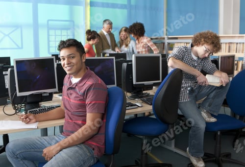 Preview: Smiling Student Studying In Computer Lab