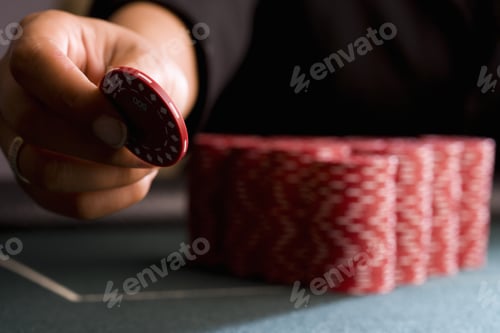 Preview: Woman Placing Gambling Chip On Table, Close-Up