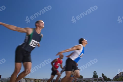 Preview: Male Sprinters On Track, Low Angle View