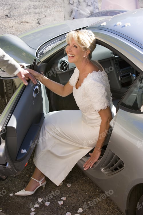 Preview: Bride Stepping Out Of Car, Smiling, Elevated View
