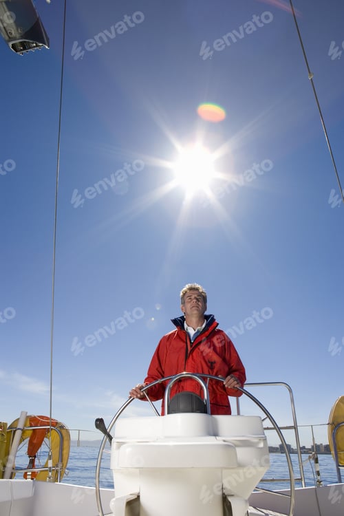 Preview: Man Steering A Boat