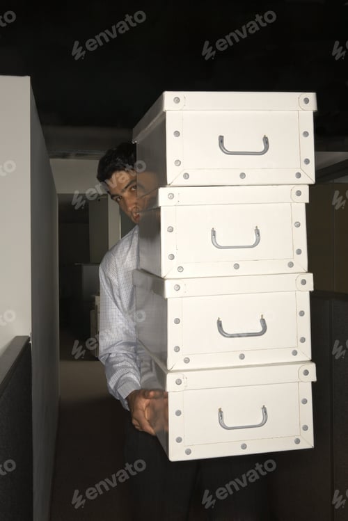 Preview: Portrait Of An Office Worker Carrying Boxes