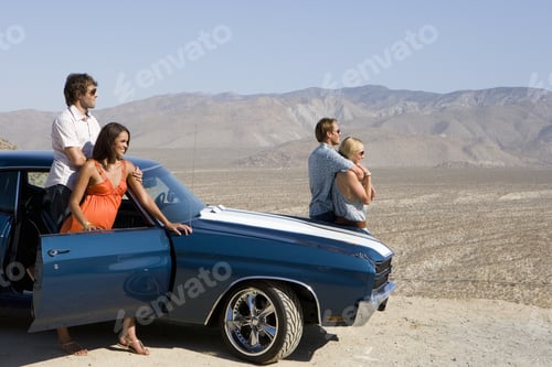 Preview: Two Couples By Car In Desert, Looking At View, Side View