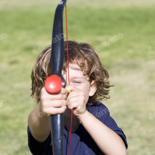Preview: A Young Boy With A Toy Bow And Arrow