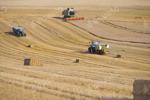 Preview: Tractors, Straw Balers And Combine In Sunny, Rural Field