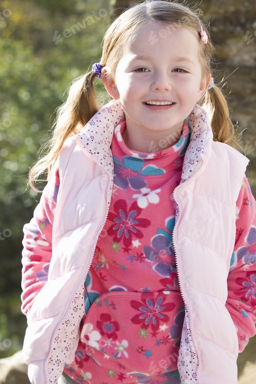 Preview: Smiling Girl Wearing Vest Outdoors