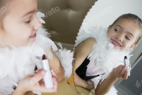 Preview: Child in Feathers Playing with Makeup by Mirror