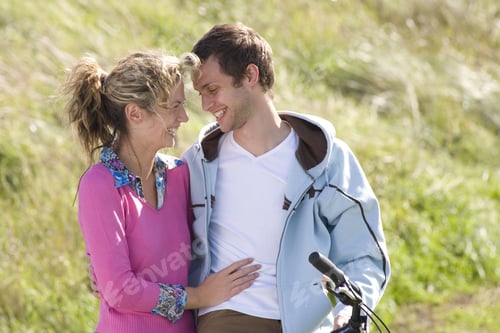 Preview: Young Couple Embracing, Smiling