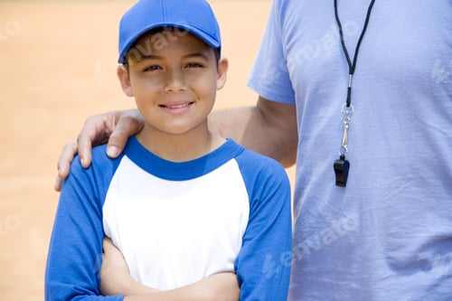 Preview: Baseball Coach With Hand On Boy'S Shoulder