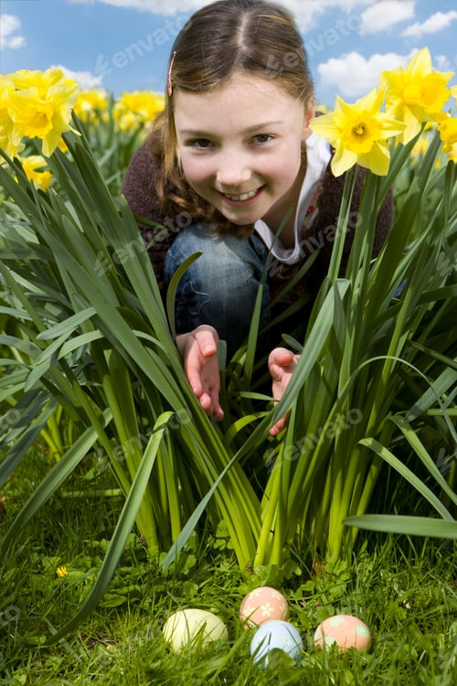 Preview: Girl Finding Easter Eggs In Grass