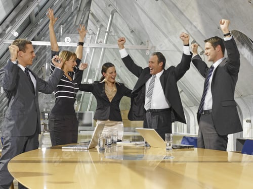 Preview: Five Business Executives Cheering In A Board Room