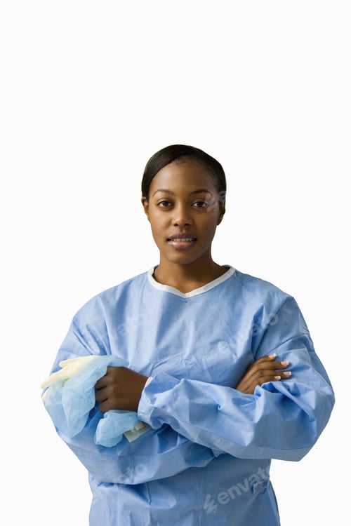 Preview: Medical Professional in Scrubs Holds Protective Gloves