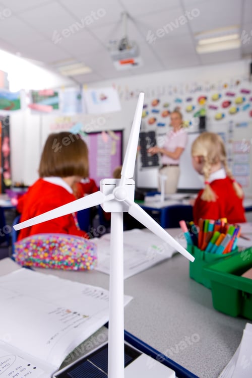 Preview: Teacher And School Children Studying Alternative Energy In Class