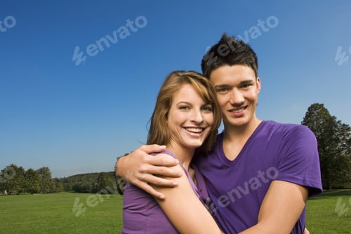 Preview: A Teenage Couple Hugging.