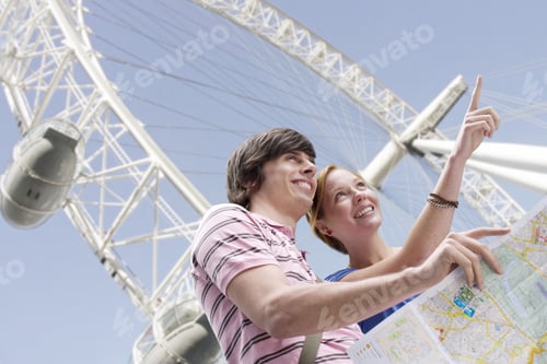 Preview: Couple Sightseeing With Map