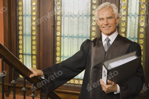 Preview: Portrait Of A Lawyer Holding A File And Smiling