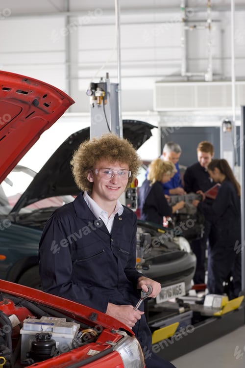 Preview: Student Repairing Car In Automotive Vocational School