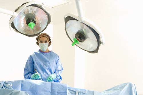 Preview: Surgeon Operating On Patient, Portrait, Low Angle View