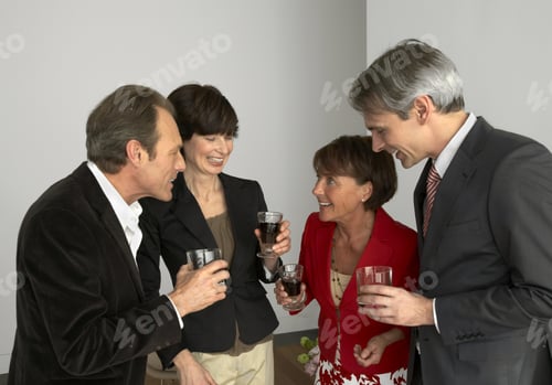 Preview: Four People Holding Wine Glasses