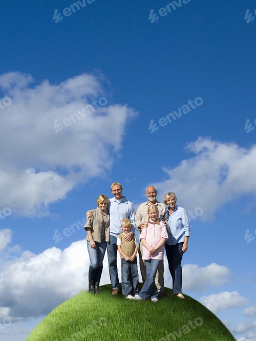 Preview: Multi-Generational Family On Top Of Grassy Globe