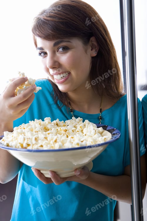 Preview: Young Woman Holding Bowl Of Popcorn, Smiling, Portrait, Close-Up