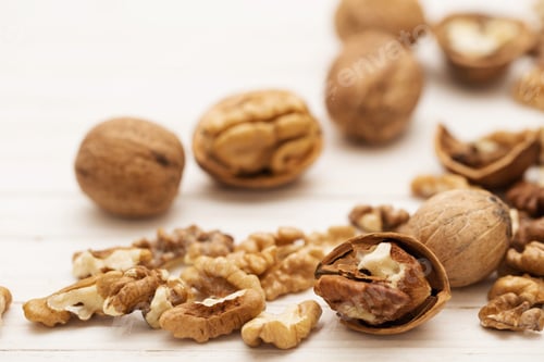 Preview: Walnuts On White Wooden Background