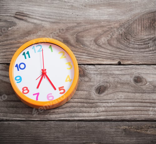 Preview: Modern Alarm Clock With Colorful Number On Wooden Background